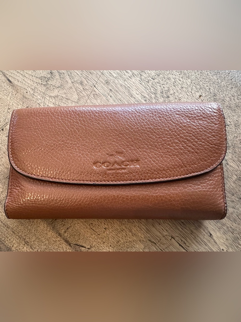 Authentic Coach Leather Checkbook Wallet in Saddle.